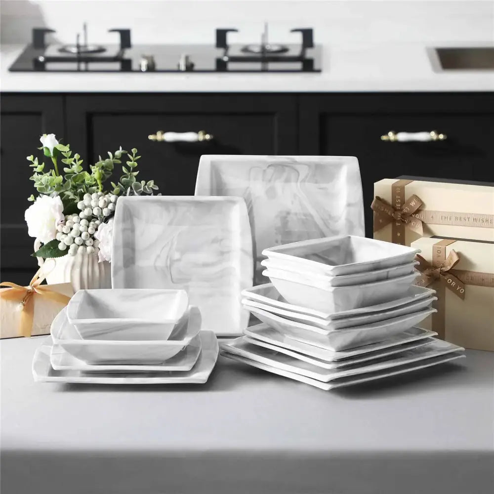 Complete set av vita keramikkärl med grå marmor mönster för BIANCA 16-delars servis