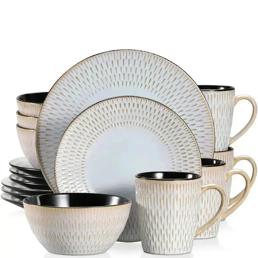 CEASAR - Servis - 16 delar komplett dinnerware set med vita och guld texturerade tallrikar, skålar och muggar