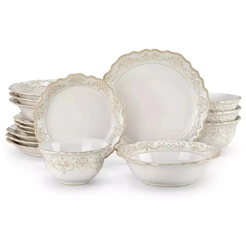 Vit keramikkärlset med utsirad, scalloped och embossed design för HEIMER 16-delars servis