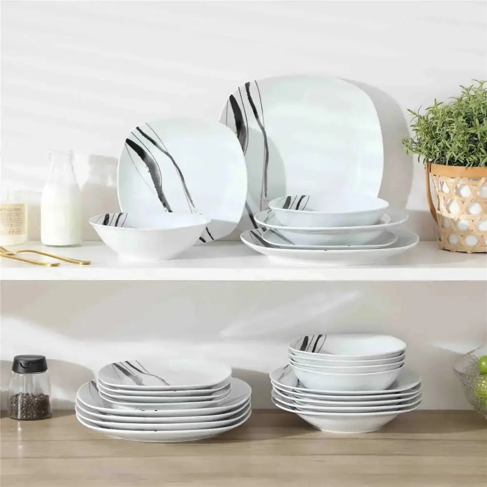 Vit servis med svart abstrakt randdesign för TERA - Servis - 24 delar