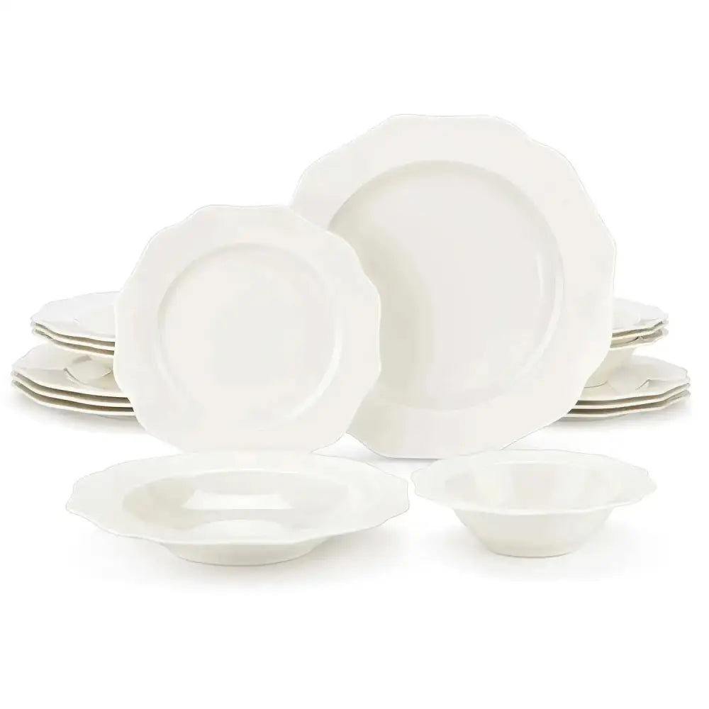 Voltaire servis med 16 delar vitt keramikbord med skummade kanter